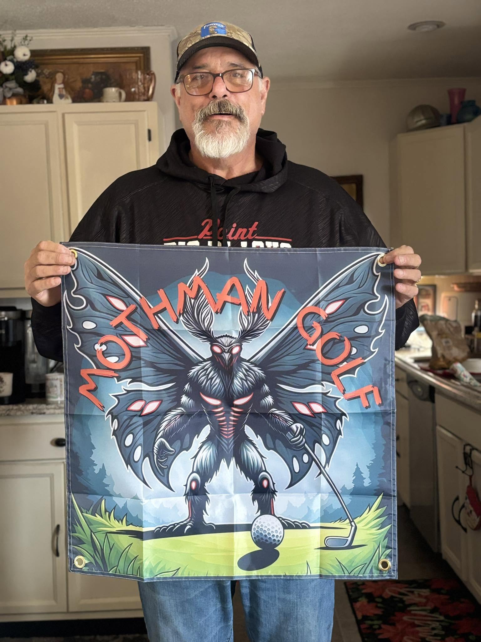 Mothman Golf flag with the legendary cryptid holding a club